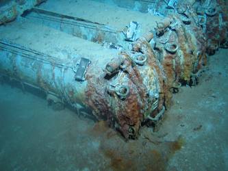 Quadruple torpedo tube mount on seabed - end caps